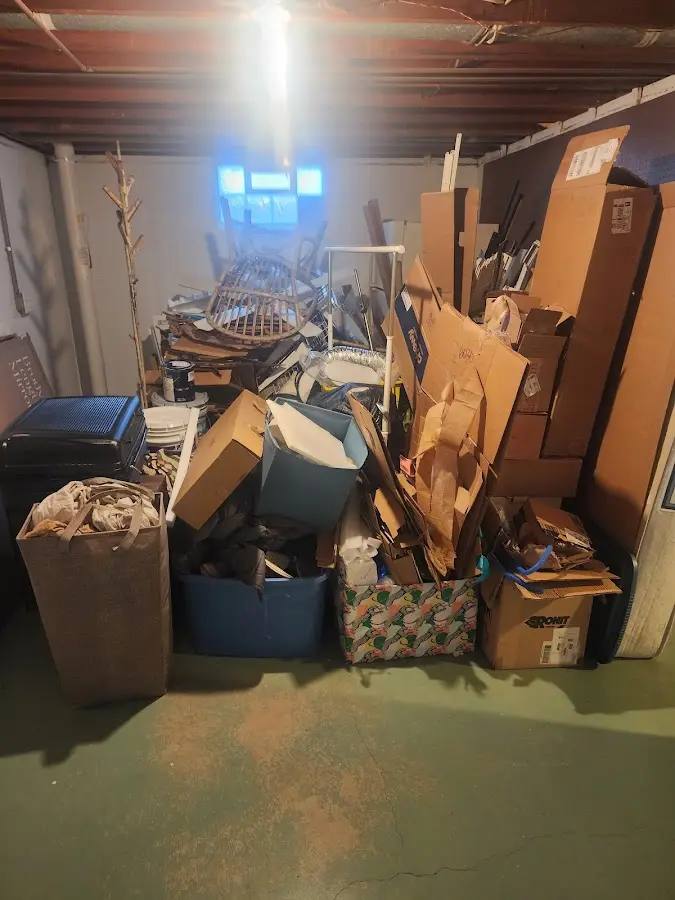 Roll-off dumpster container at job site for 20 Yard Dumpster Rental in Campton